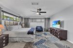 Master king bedroom with twin trundle/daybed and bedside chair